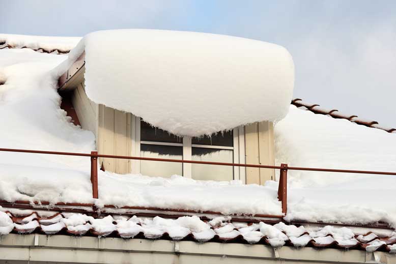 How to Safely Remove Snow From Your Roof